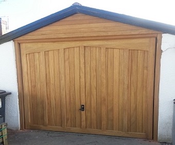 Woodrite Idigbo up and over garage door installed by us
